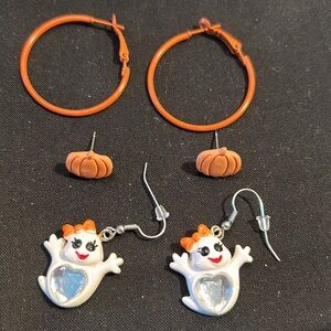 3 pr of Halloween earrings. Ghost girl fish hooks, orange hoops & pumpkin studs.
